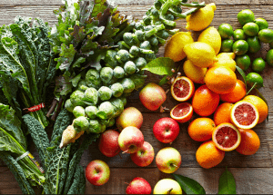 a group of fruits and vegetables on a wood surface Healthy Weight Loss Diets Warfield
